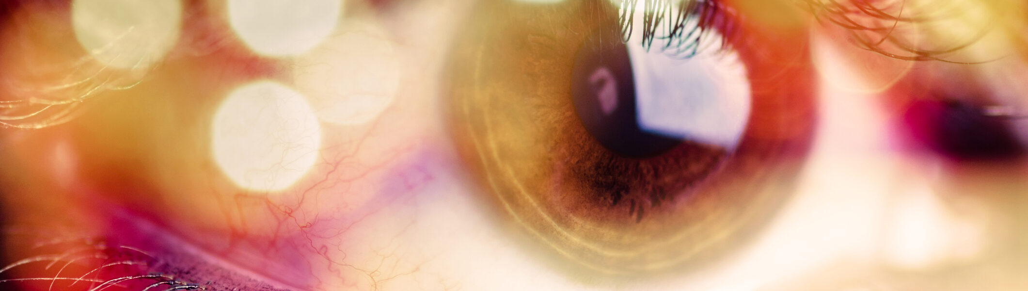 Double exposure of an eye with bokeh. Surreal image of an eye.