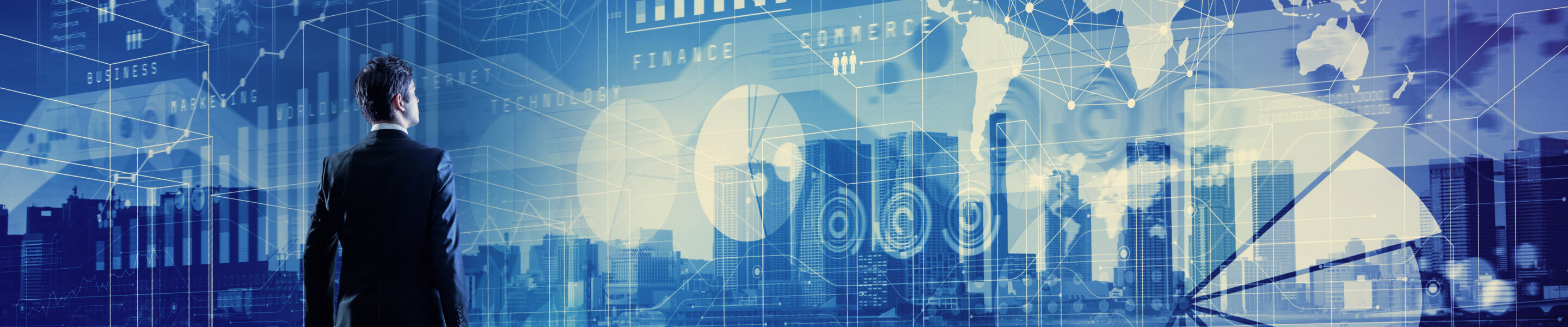 standing businessman who looks various graphics of business. Internet of Things. Information Communication Technology. Digital transformation. Abstract mixed media.